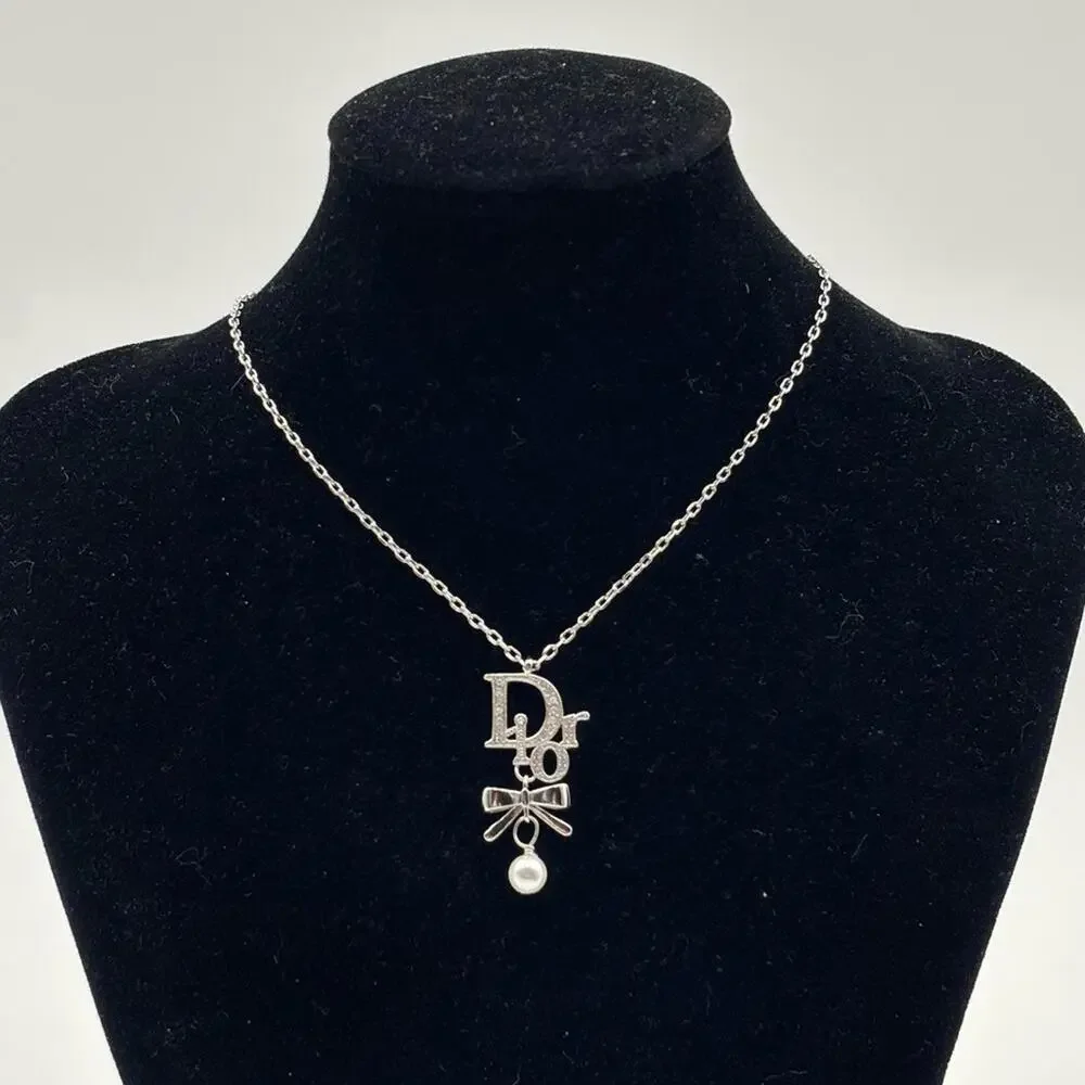 Christian Dior Silver Ribbon Pearl Pendant Necklace - Picture 2 of 6